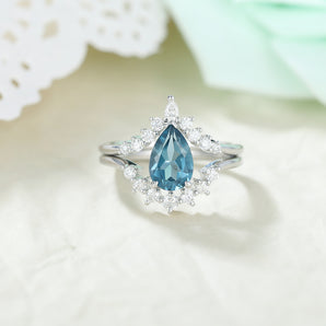 IRROYA Moissanite Ring - 925 Sterling Silver Wedding Band - Topaz Wedding Sets - Retro 1.50 Carat Natural London Blue Topaz Ring - Pear Shape Moissanite Women Ring - Birthstone Ring - Birthday Gifts