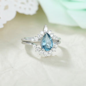 IRROYA Moissanite Ring - 925 Sterling Silver Wedding Band - Topaz Wedding Sets - Retro 1.50 Carat Natural London Blue Topaz Ring - Pear Shape Moissanite Women Ring - Birthstone Ring - Birthday Gifts